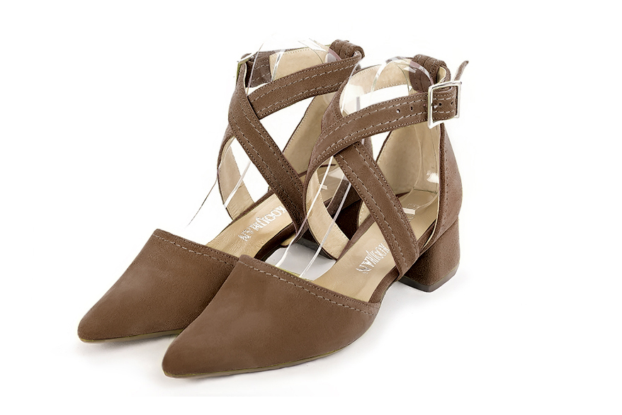 Women's chocolate brown open side dress shoes, with crossed straps. Tapered toe. Low flare heels - Front view